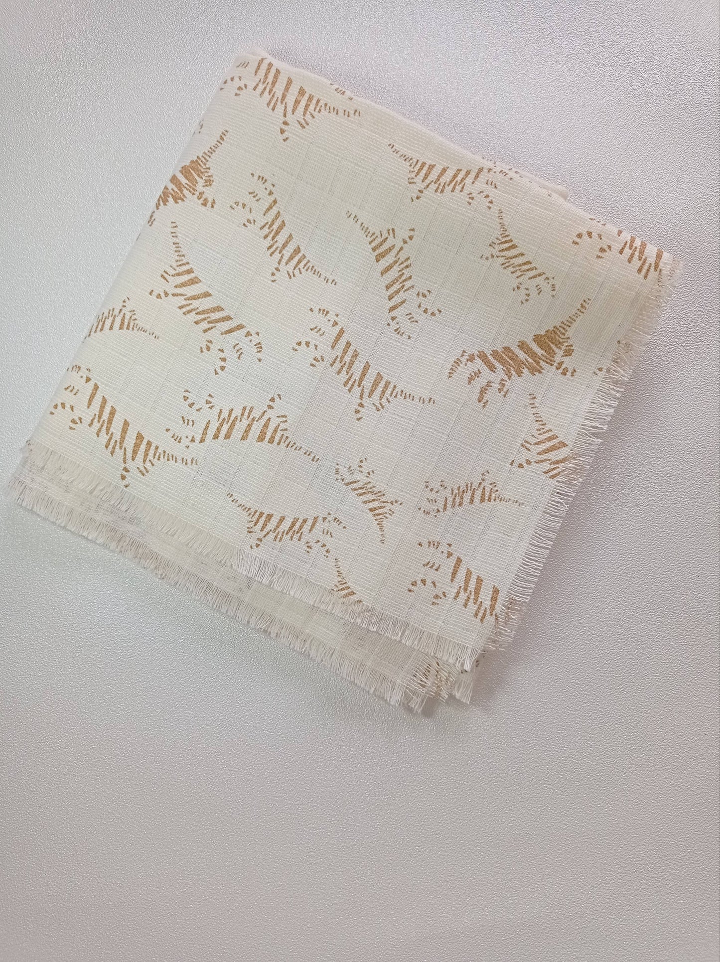 Cache nez crème plié bordés de franges
